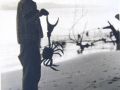 Old photo of Rita hold large crab (circa 1954)